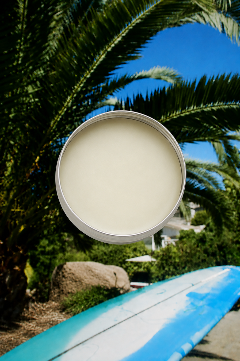 Seaker Sun Co reef-safe sun balm tin held outdoors – zinc oxide formula for surfers and swimmers